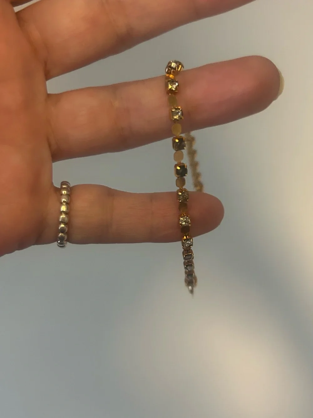 Gold-Tone Crystal Tennis Bracelet - Elegant Women's Jewelry Black and White.